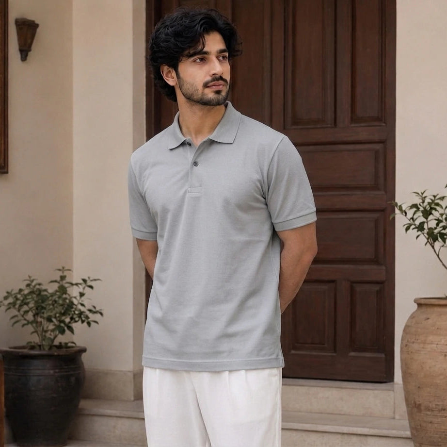 Model wearing a premium pastel grey polo shirt for men